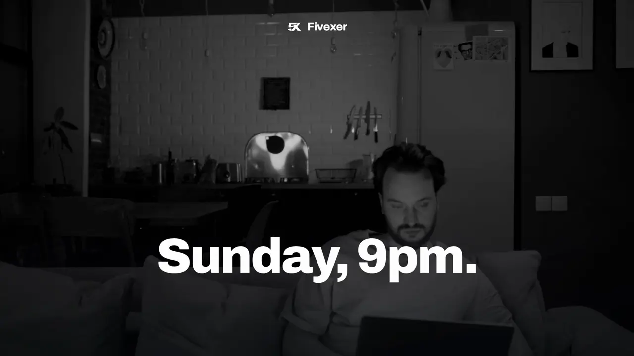A manager on a sofa late on Sunday evening, working on next week's rota on a laptop.
